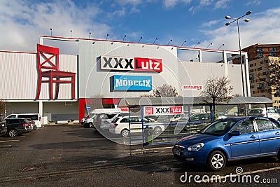 XXXLutz Mobelix corporation logo on supermarket building Editorial Stock Photo