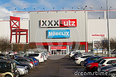 XXXLutz Mobelix corporation logo on supermarket building Editorial Stock Photo