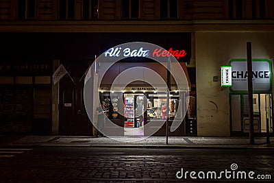 Kebab fast food restaurant at night in the center of Prague. Editorial Stock Photo