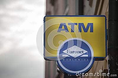 Euronet Worldwide logo indicating one of their ATM in Prague. Editorial Stock Photo