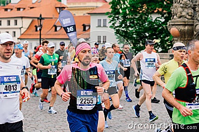 Prague, Czechia - 7th May 2023 - Group athletes runners run marathon in sunlight Editorial Stock Photo