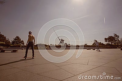 Prague metronom view with skateboarding young man at Letna district Editorial Stock Photo