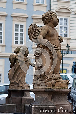 Prague, sculpture of a plump baby angel Stock Photo