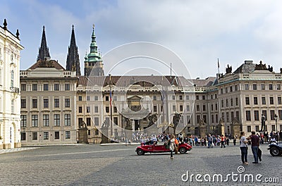 PRAGUE, SEPTEMBER 15: The crowd of tourists on the square in front of the entrance to the Old Royal Palace on September 15, 2014 i Editorial Stock Photo