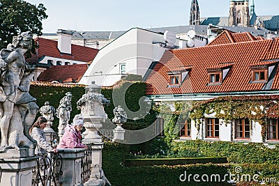 Prague, September 18, 2017: Elderly women or friends, tourists or pensioners, locals look at the medieval architecture Editorial Stock Photo