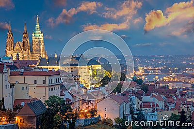 Prague at sundown time and Famous Saint Vitus' Cathedral Stock Photo