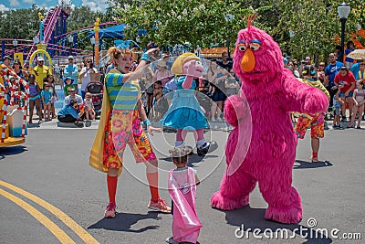 Prairie Dawn , Telly monster, dancer woman and little girl in Sesame Street Party Parade at Seaworld 1 Editorial Stock Photo