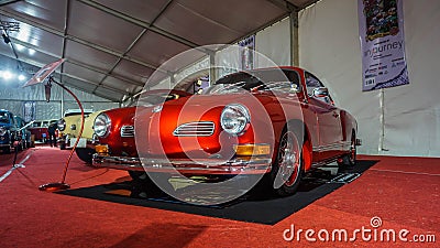 Red Volkswagen Karmann Ghia coupe in Jogja VW festival Editorial Stock Photo