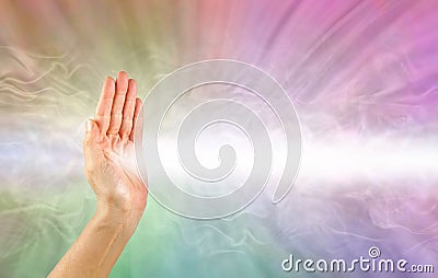 Pranic healer using right hand to beam healing energy Stock Photo