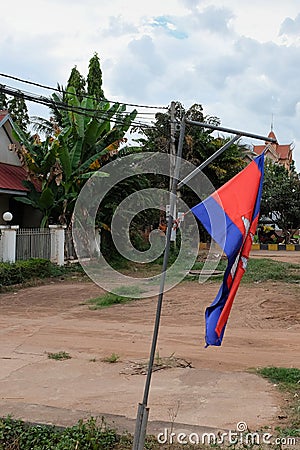 Prapor cambodia swaying in the wind, an overcast evening in south east asia Stock Photo