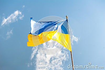 Prapor Ukrainy with equally sized horizontal bands of blue and yellow - blue sky Stock Photo