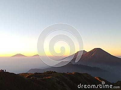 Prau Mountain Golden Sunrise Stock Photo