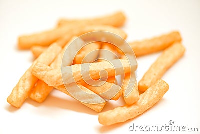 Prawn crackers stick isolated on white background - homemade crunchy prawn crackers or shrimp crisp traditional snack Stock Photo