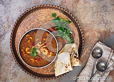 Prawn curry shrimp masala garnished with cilantro Stock Photo