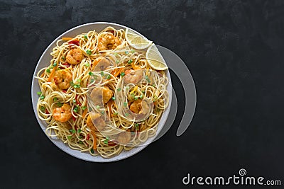 Prawn Schezwan Noodles with vegetables Stock Photo