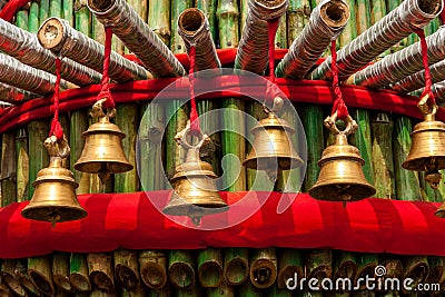 Prayer bells in a temple Stock Photo