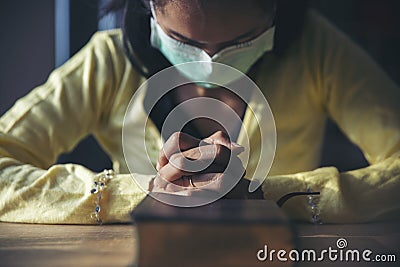 Prayer and bible in New Normal concept. Stock Photo