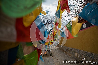 Prayer flags blow in Shangri-La, China. Stock Photo