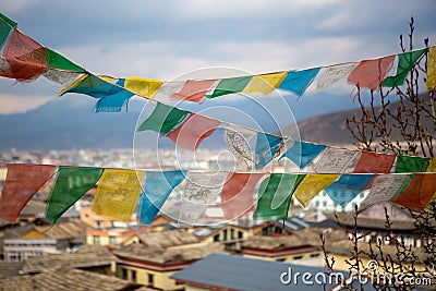 Prayer flags blow in Shangri-La, China. Stock Photo