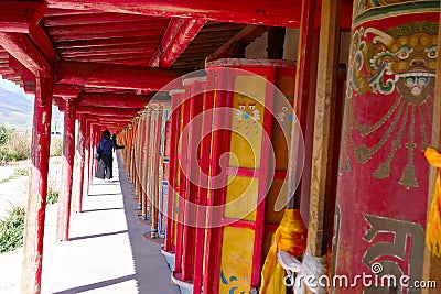 Prayer wheel in Tibetan Buddhist monastery Arou Da Temple in Qinghai China Editorial Stock Photo