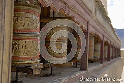 Prayer wheels aside Wanla Gompa, Ladakh Stock Photo