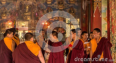 Prayers in Buddhist temple Editorial Stock Photo