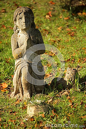 Praying child sculpture Stock Photo