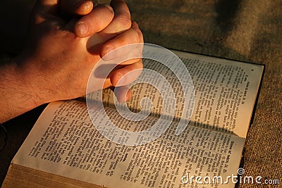 Praying Hands Bible Stock Photo