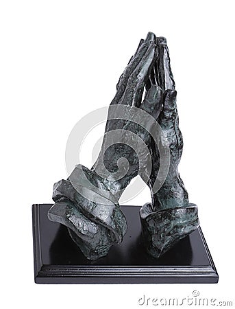 Praying hands statue Stock Photo