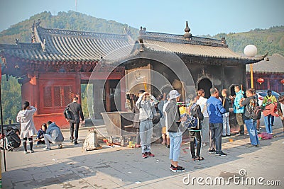 Praying people in WuTaiShan temple, Shanxi, China Editorial Stock Photo