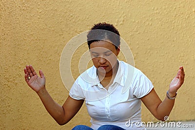 Praying woman Stock Photo