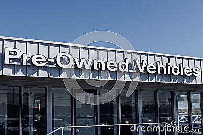 Pre Owned Vehicles sign at a Used Car Dealership Sign Pre Owned IV Editorial Stock Photo