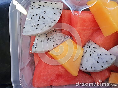 Pre packed cut fruit on sale in a supermarket Stock Photo