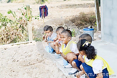 Pre-school age,student in Thailand brush the teeth after finished lunch time Editorial Stock Photo