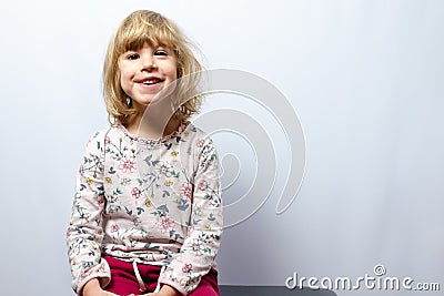 Preschool girl studio portrait on clean background Stock Photo