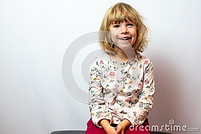 Preschool girl studio portrait on clean background Stock Photo