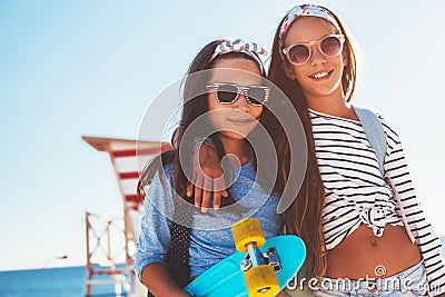 Pre teen children with skateboards Stock Photo