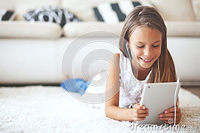 Pre teen girl with tablet pc Stock Photo