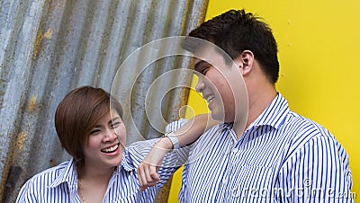 Pre wedding shooting : Girlfriend leans her arm on boyfriend`s s Stock Photo