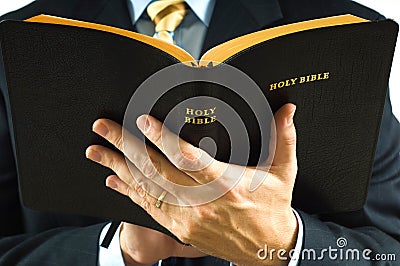 Preacher with Bible Stock Photo