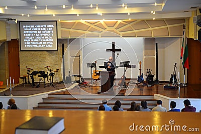 Preaching in Evangelical church and Bible Editorial Stock Photo