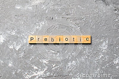 Prebiotic word written on wood block. prebiotic text on table, concept Stock Photo