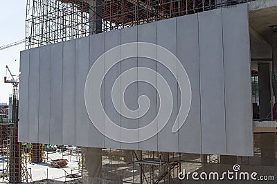 Precast concrete walls on building structures Concrete wall panel Building construction. Stock Photo