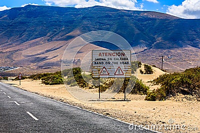 Precautions are taken at Surfers Beach Famara. Stock Photo