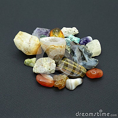 Precious and semiprecious stones and minerals for stone therapy and exotic facial massage with chilled stones and gems. A handful Stock Photo
