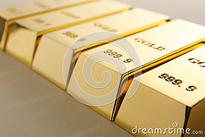 Precious shiny gold bars on light background Stock Photo