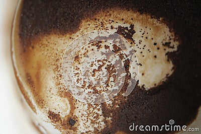 Precipitate coffee cup. Macro coffee grounds. Brown background, texture cinnamon Stock Photo