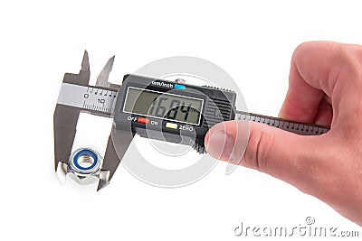 Measuring with electronic digital caliper Stock Photo