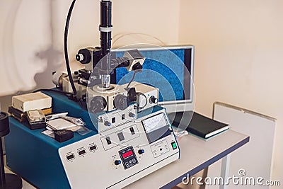 Precision micrometer grinder polishing machine with an optical m Stock Photo