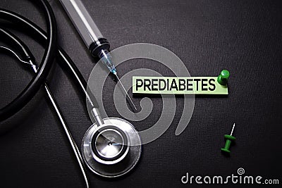 Prediabetes text on Sticky Notes. Top view isolated on black background. Healthcare/Medical concept Stock Photo